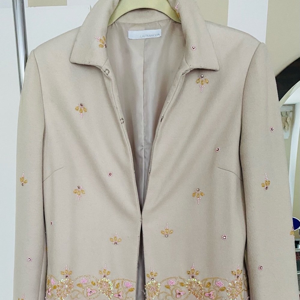 Laltramoda Coat with exquisite embroidery of crystals and sequins.